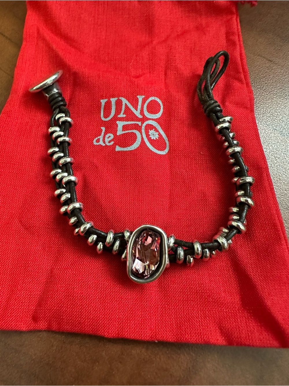 UNO de 50 Dark Leather Bracelet with Pink Crystal Accent